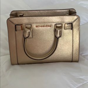 Michael Kors gold handbag